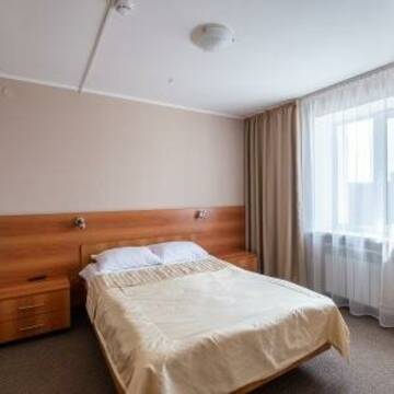 Джуниор Сюит с двуспальной кроватью в Гостинице Авиатор