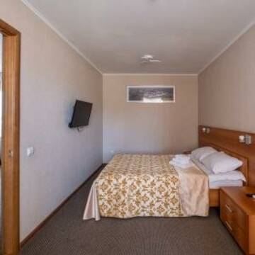 Джуниор Сюит с двуспальной кроватью в Гостинице Авиатор